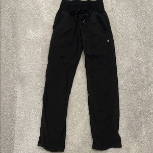 Lululemon Black dance studio midrise pants. No size tag.  See photos for pilling